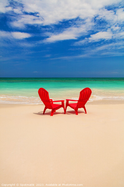 Tranquil holiday destination with red chairs on beach Picture Board by Spotmatik 