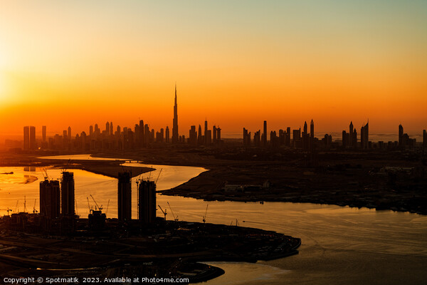 Aerial Dubai sunset a famous travel tourism destination  Picture Board by Spotmatik 