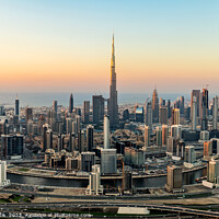 Buy canvas prints of Aerial view Dubai city skyscrapers Burj Khalifa UAE by Spotmatik 