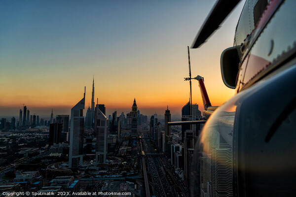 Aerial Dubai sunset helicopter flying Sheikh Zayed Road Picture Board by Spotmatik 
