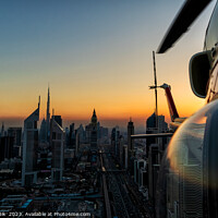 Buy canvas prints of Aerial Dubai sunset helicopter flying Sheikh Zayed Road by Spotmatik 