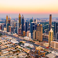 Buy canvas prints of Aerial cityscape sunset view of Dubai city UAE by Spotmatik 
