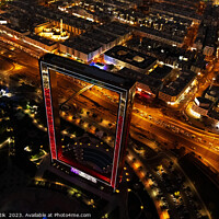 Buy canvas prints of Aerial illuminated night view Dubai city Frame UAE  by Spotmatik 