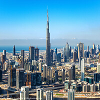 Buy canvas prints of Aerial view of Burj Khalifa city skyscrapers UAE by Spotmatik 