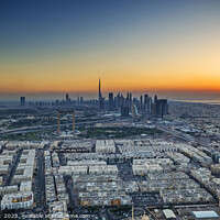 Buy canvas prints of Aerial sunset view of Dubai city skyscrapers UAE  by Spotmatik 