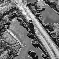 Buy canvas prints of Aerial giant dump trucks Athabasca Tar sand site  by Spotmatik 