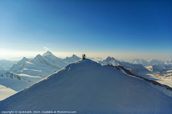 Aerial view Switzerland climbers on mountain summit Europe Picture Board by Spotmatik 