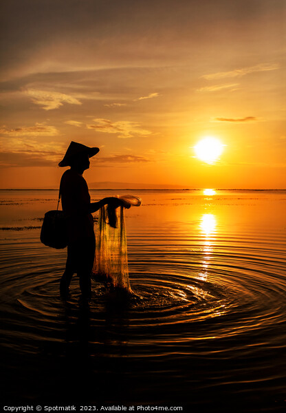 Flores sea Balinese male at sunrise fishing Bali  Picture Board by Spotmatik 