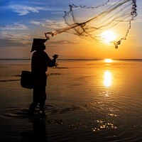 Buy canvas prints of Indian ocean Balinese fisherman at sunrise fishing Indonesia by Spotmatik 