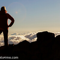 Buy canvas prints of Panoramic Silhouette young female hiker Haleakala Park Maui by Spotmatik 