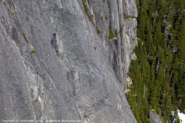 Aerial male climber rocky cliff face Squamish Canada  Picture Board by Spotmatik 