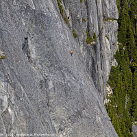 Buy canvas prints of Aerial male climber rocky cliff face Squamish Canada  by Spotmatik 