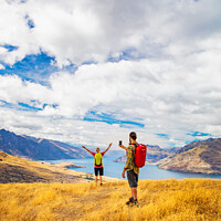 Buy canvas prints of Young male taking picture of female friend Queenstown by Spotmatik 