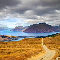 Buy canvas prints of Adventure couple walking near Lake Wakatipu South Island by Spotmatik 