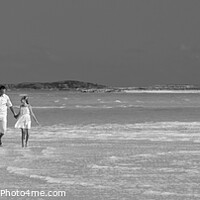 Buy canvas prints of Panorama of mother father with family walking on beach  by Spotmatik 