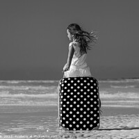 Buy canvas prints of Girl sitting on red polka dot travel suitcase  by Spotmatik 