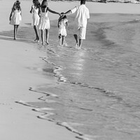 Buy canvas prints of Young Caucasian girls parents on tropical island beach by Spotmatik 
