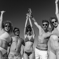 Buy canvas prints of Beach party fun friends in swimwear enjoying vacation by Spotmatik 