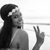 Buy canvas prints of Happy Indian girl enjoying freedom outdoors on beach by Spotmatik 
