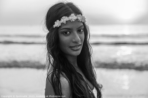 Young Indian woman by ocean on Summer vacation Picture Board by Spotmatik 