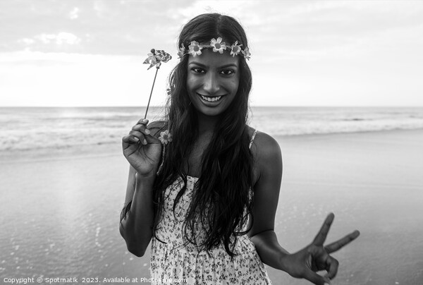 Freedom outdoors for smiling Indian girl by ocean Picture Board by Spotmatik 