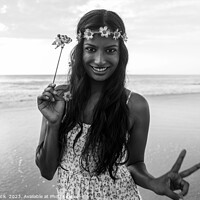 Buy canvas prints of Freedom outdoors for smiling Indian girl by ocean by Spotmatik 