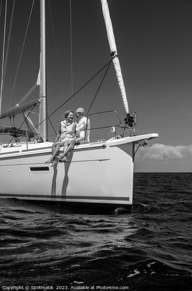 Loving retired couple relaxing together on luxury yacht Picture Board by Spotmatik 