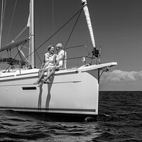 Buy canvas prints of Loving retired couple relaxing together on luxury yacht by Spotmatik 