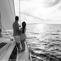 Buy canvas prints of Hispanic couple travelling on luxury yacht at sunset by Spotmatik 
