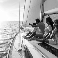 Buy canvas prints of Relaxed family on luxury yacht sailing towards sunset by Spotmatik 