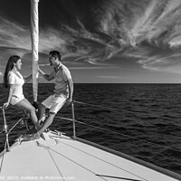 Buy canvas prints of Hispanic couple enjoying luxury travel on private yacht by Spotmatik 
