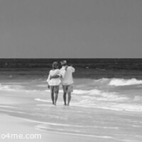 Buy canvas prints of Panoramic view retired couple walking by turquoise ocean by Spotmatik 