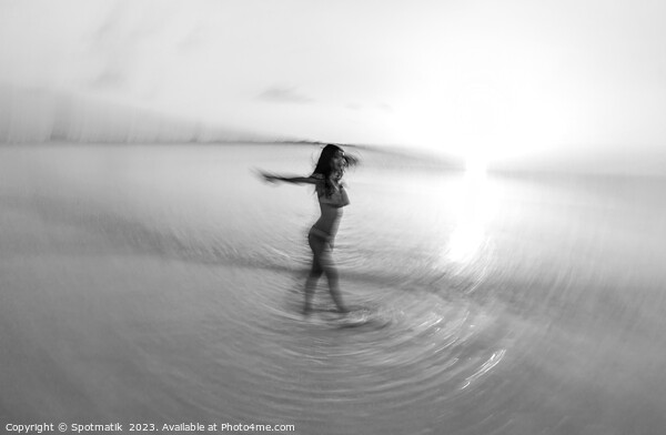 Motion blurred sunset ocean view with dancing female Picture Board by Spotmatik 