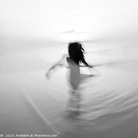 Buy canvas prints of Motion blurred Asian girl dancing in ocean sunrise by Spotmatik 