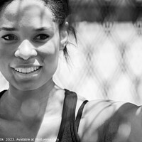 Buy canvas prints of Afro American female smiling after healthy outdoor exercise by Spotmatik 