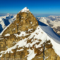 Buy canvas prints of Aerial view of Switzerland mountain Peak cliff face by Spotmatik 
