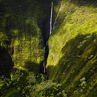 Buy canvas prints of Aerial Molokai valley waterfalls a volcanic Pacific ocean  by Spotmatik 