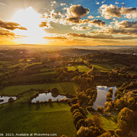 Buy canvas prints of Aerial London sunset view of greenbelt countryside England by Spotmatik 