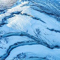 Buy canvas prints of Aerial Icelandic volcanic frozen glacial river meltwater Europe by Spotmatik 