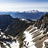 Buy canvas prints of Aerial snow capped Wilderness Rocky mountains Vancouver Canada  by Spotmatik 