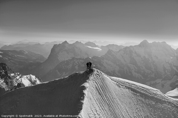 Aerial Switzerland two climbers on mountain summit Europe Picture Board by Spotmatik 