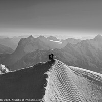 Buy canvas prints of Aerial Switzerland two climbers on mountain summit Europe by Spotmatik 