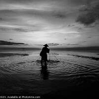 Buy canvas prints of Balinese fisherman casting net Flores sea at sunrise by Spotmatik 