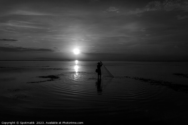 Silhouette Balinese sunrise fisherman casting net Flores sea Picture Board by Spotmatik 