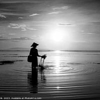 Buy canvas prints of Balinese fisherman at sunrise in Silhouette fishing Asia by Spotmatik 
