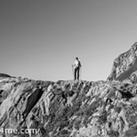 Buy canvas prints of Panoramic rugged terrain of Snowdonia with female hiker by Spotmatik 