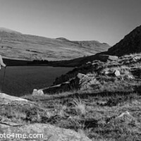 Buy canvas prints of Panoramic lake Snowdonia National Park with female hiker by Spotmatik 