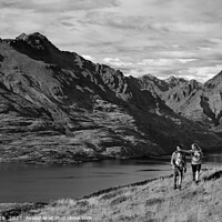 Buy canvas prints of Hikers on trekking expedition enjoying view Lake Wakatipu  by Spotmatik 