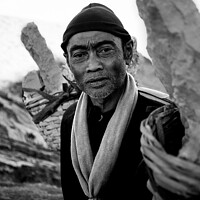 Buy canvas prints of Sulphur blocks carried by male Indonesian worker Asia by Spotmatik 