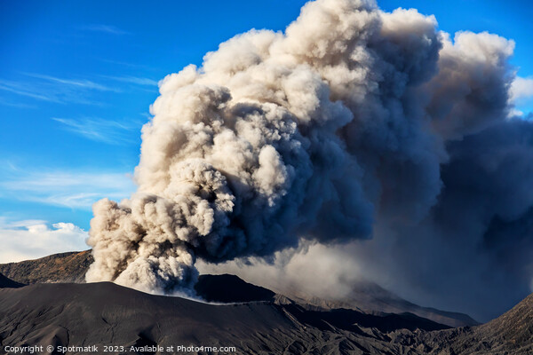 Erupting smoke and ash from Mount Bromo summit  Picture Board by Spotmatik 